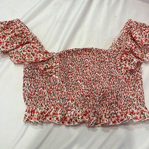 It’s a really cute top that goes off the shoulder comfy and stretchy